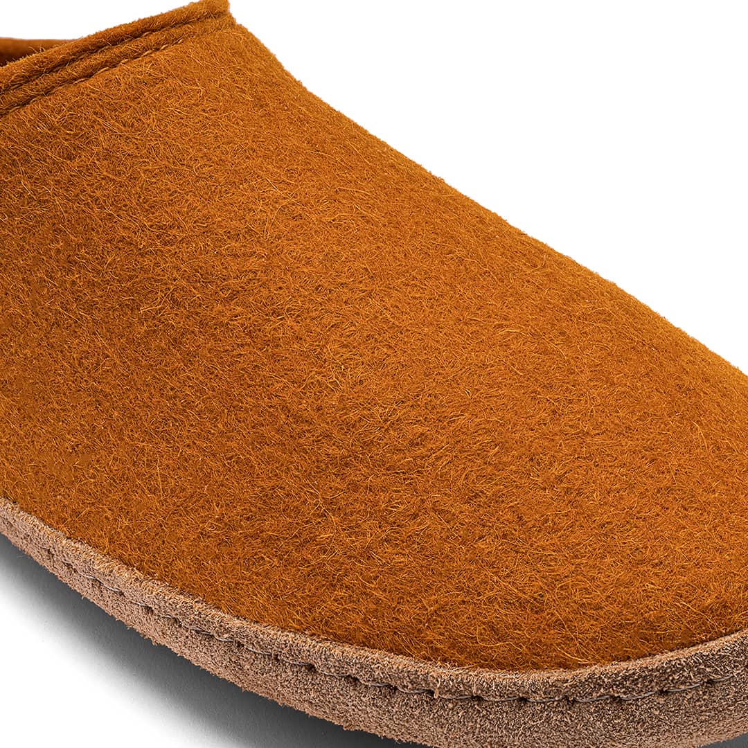 Kyrgies Indoor Wool Slides, rust wool felt, close-up view of upper texture