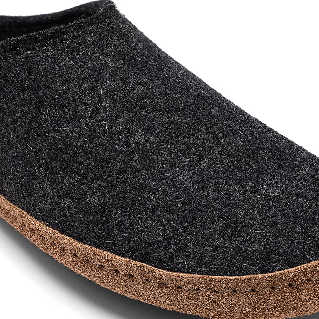 Kyrgies Indoor Wool Slides, charcoal wool felt, angled front view showing leather sole