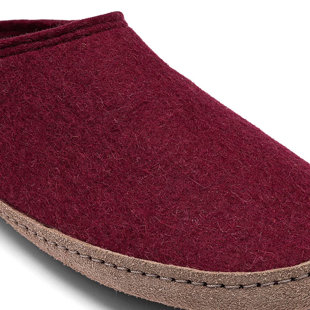 Kyrgies Indoor Wool Slides, burgundy wool felt, angled front view showing leather sole