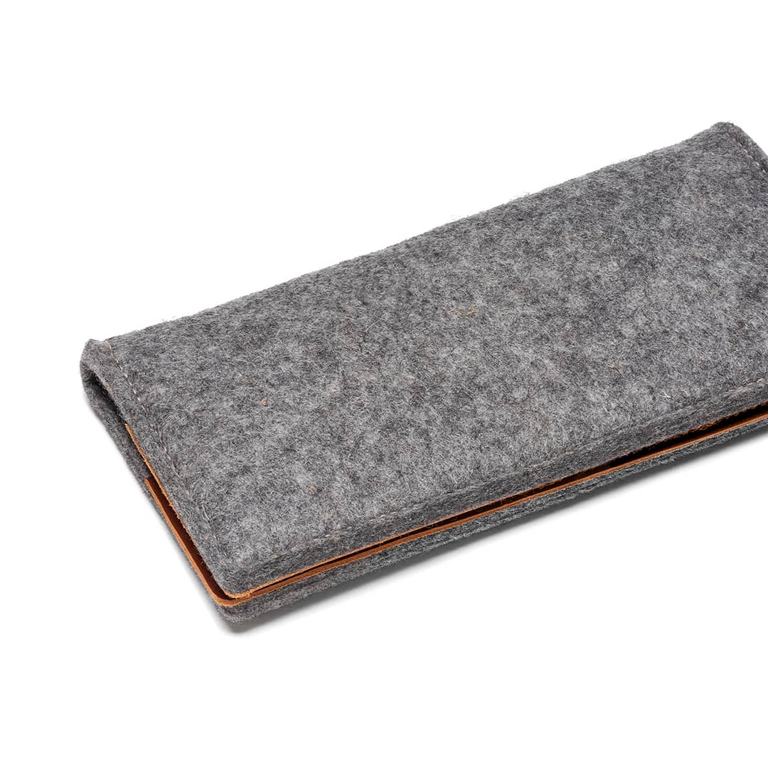 Closed Kyrgies travel wallet crafted from durable wool felt and leather accents