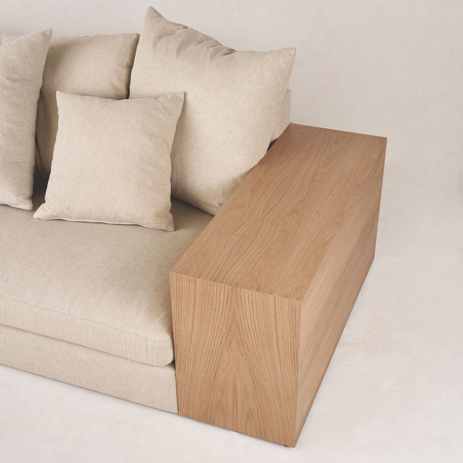 Wood side panel detail of Topa Topa sofa with linen seat and back cushions