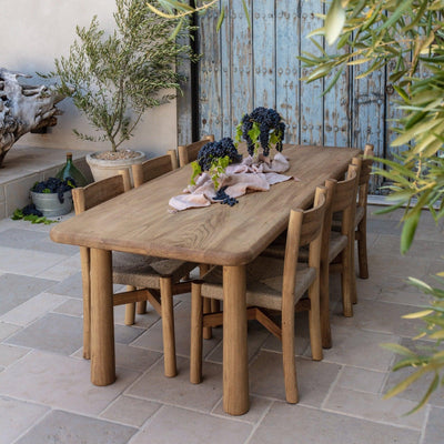 Nonna dining chair paired with Topa Topa dining table in warm oak