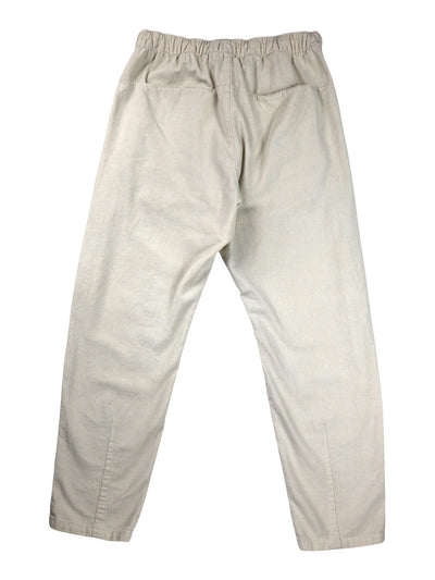 Back product view of natural off-white Canvas Souk pants with an elastic waistband.