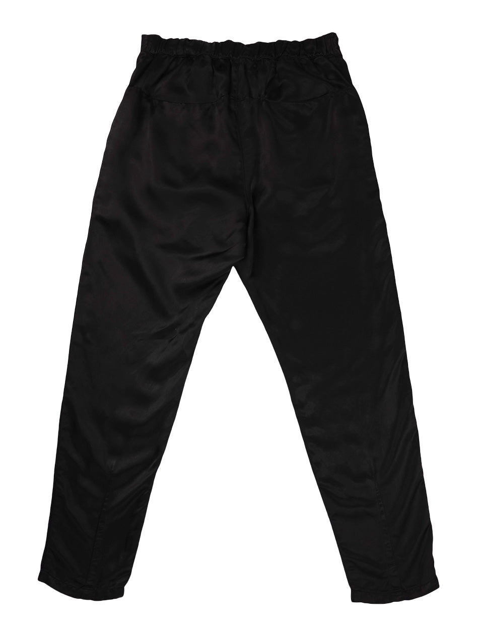 Back product view of black Souk pants with an elastic waistband.