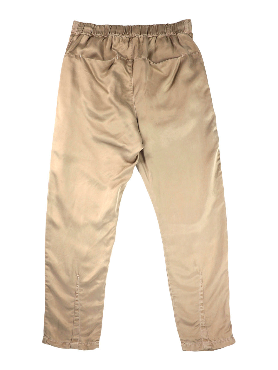 Back product view of tan Souk pants with an elastic waistband.