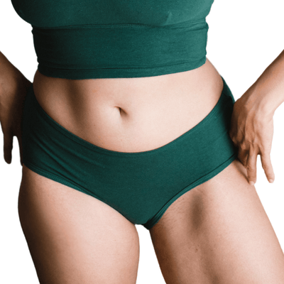 Model wearing Organic Cotton Mid-Rise Brief in Lagoon, front view