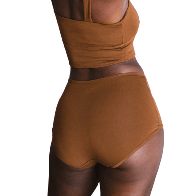 Model wearing Organic Cotton High-Rise Brief in Ella Nude, close-up back view