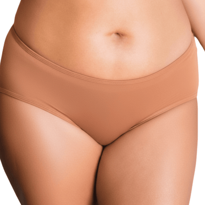 Model wearing Organic Cotton Mid-Rise Brief in Maya Nude, front view