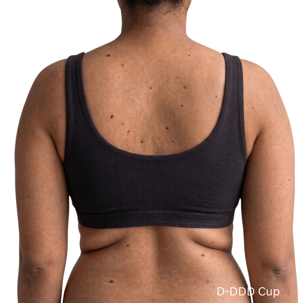 Back view of model wearing Organic Cotton Everyday Bralette in Black, D-DDD cup