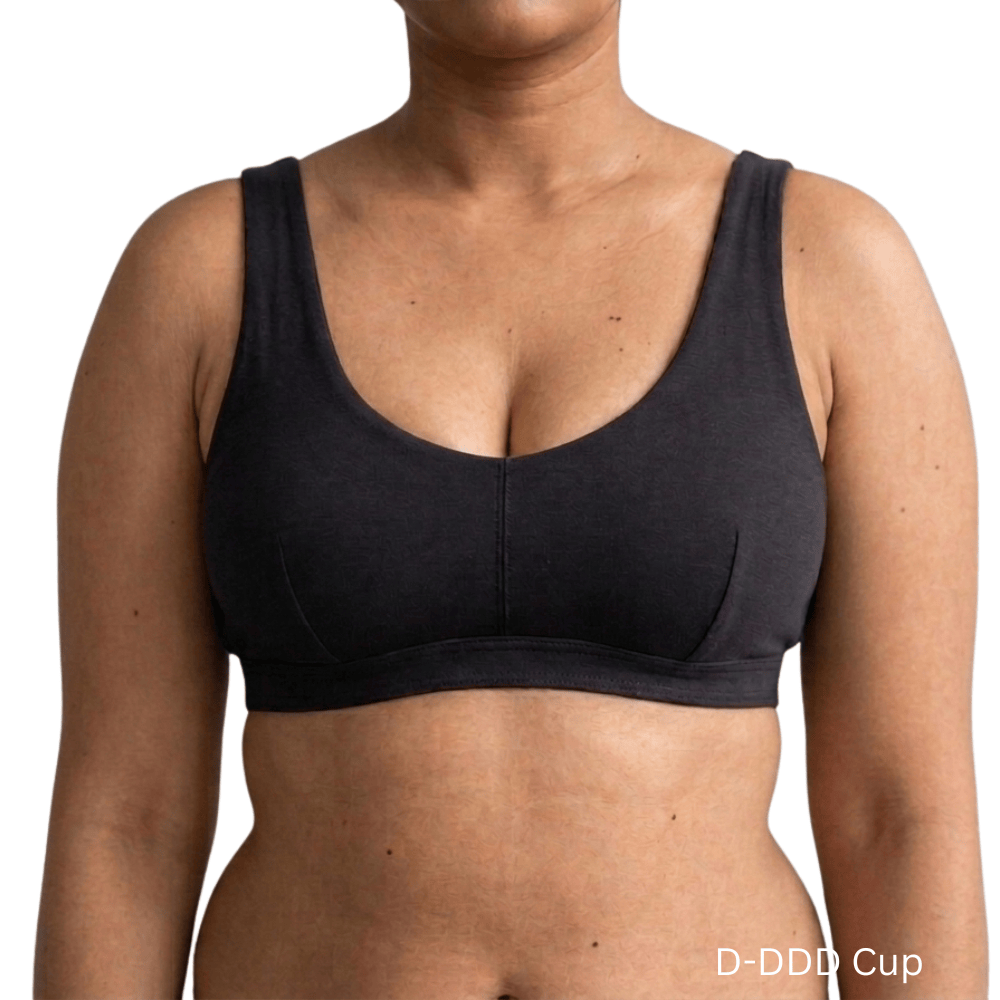 Model wearing Organic Cotton Everyday Bralette in Black, D-DDD cup, front view