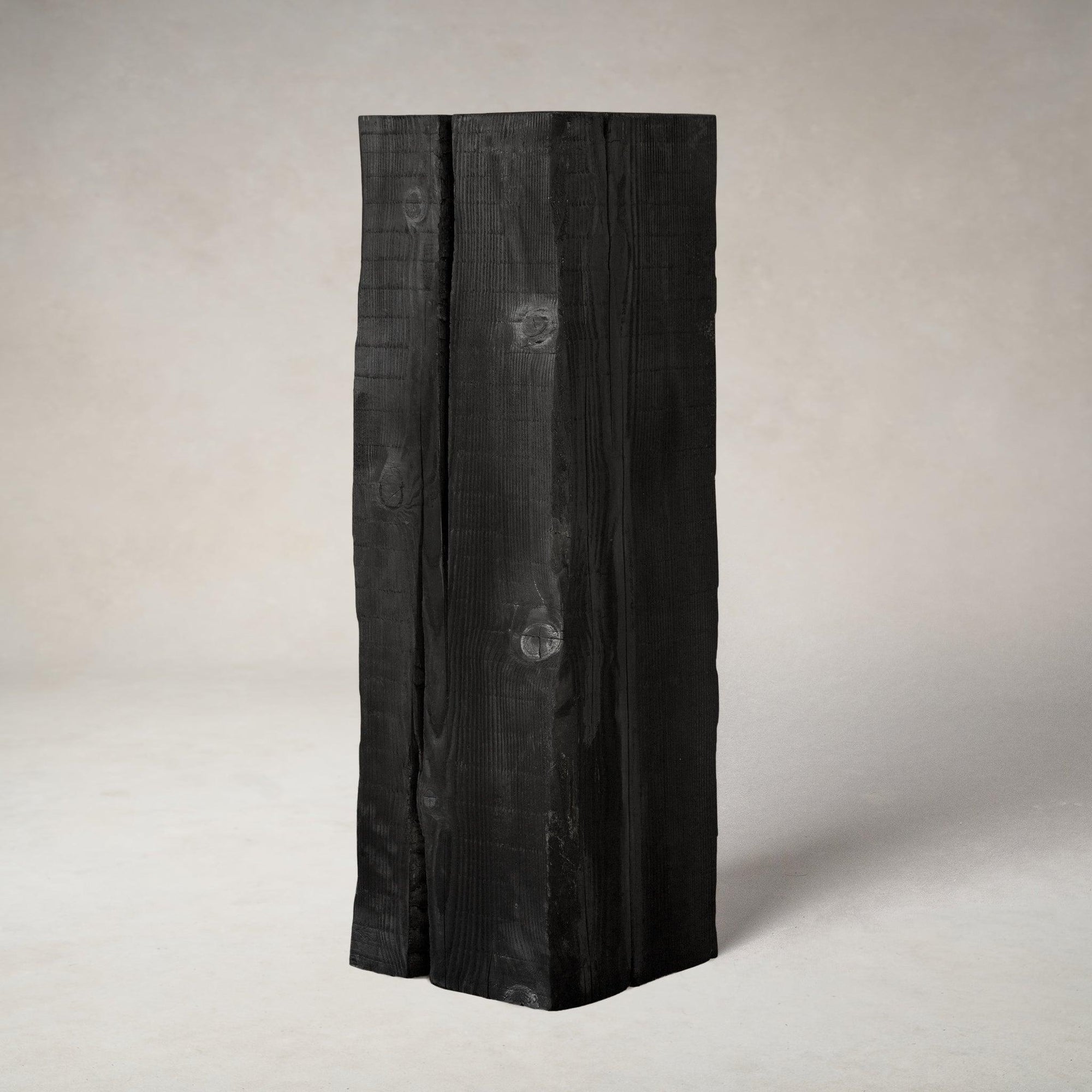 Charcoal sculpture pedestal in shou sugi ban Douglas fir, studio front view