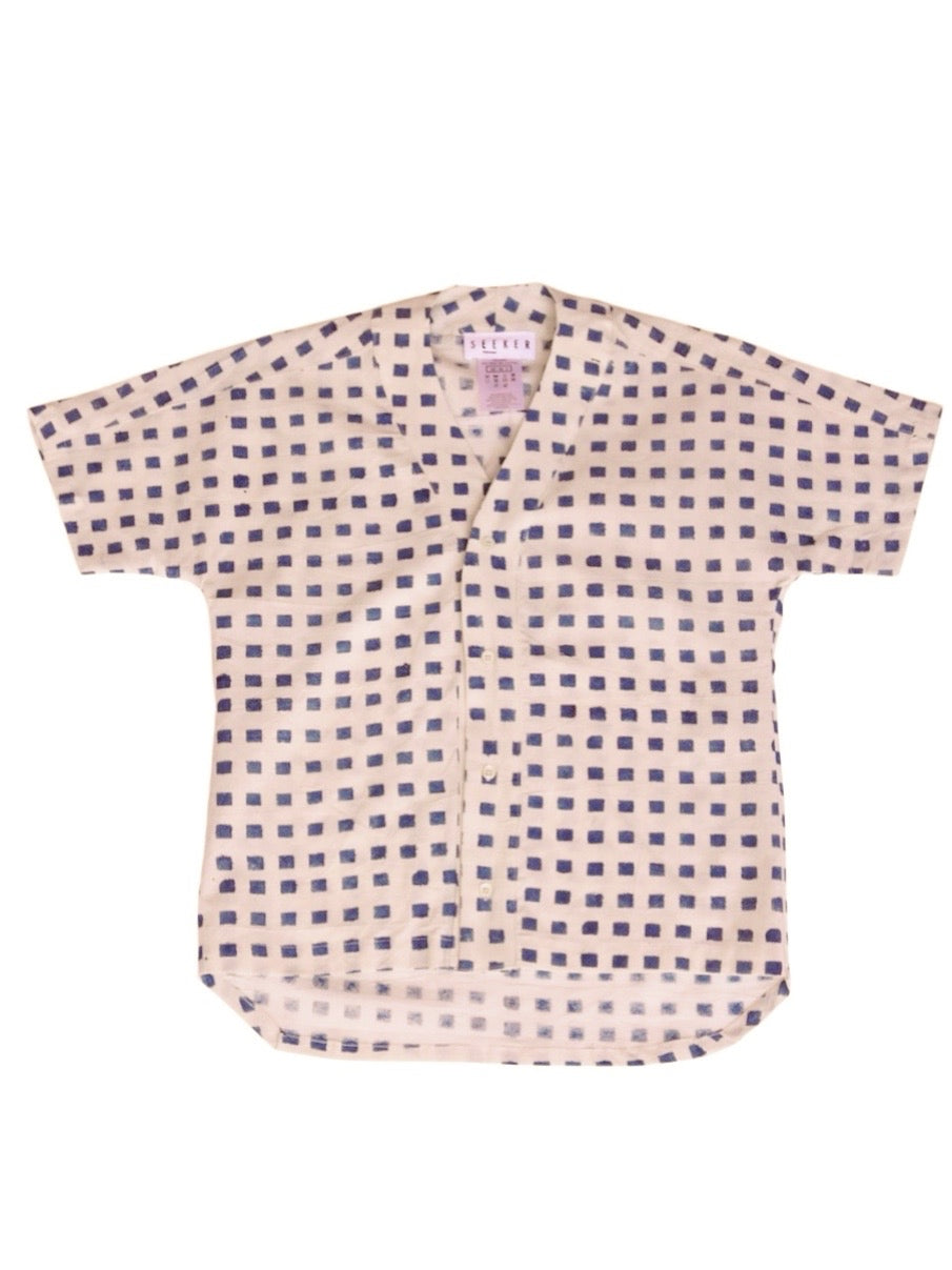Front product view of the cream baseball shirt with indigo hand-block-printed squares.