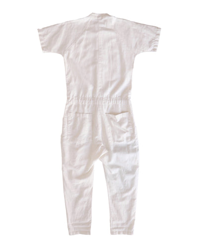 Back flat-lay view of the white short-sleeve jumpsuit.