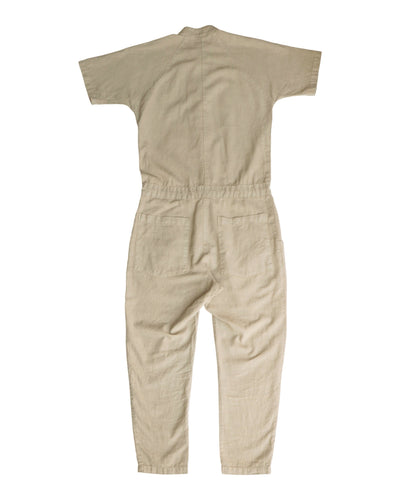 Back flat-lay view of the tan short-sleeve jumpsuit.