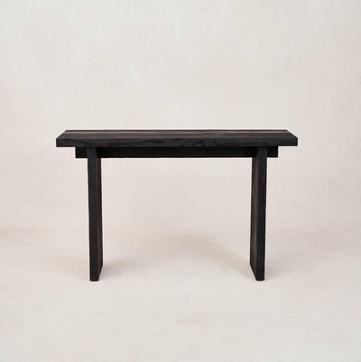 A black Shou Sugi Ban entry console made of wood, displayed against a neutral background.