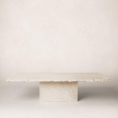 Sofita marble coffee table with minimal veining and sculptural pedestal base