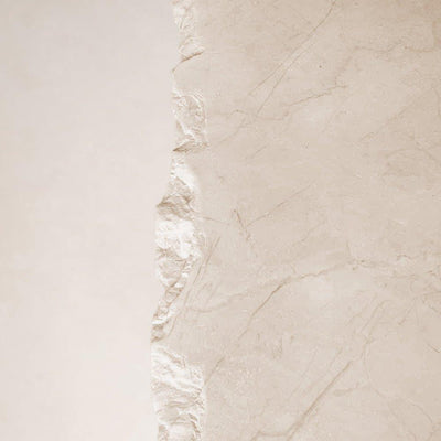 Matte marble surface detail of Sofita coffee table with natural stone variation