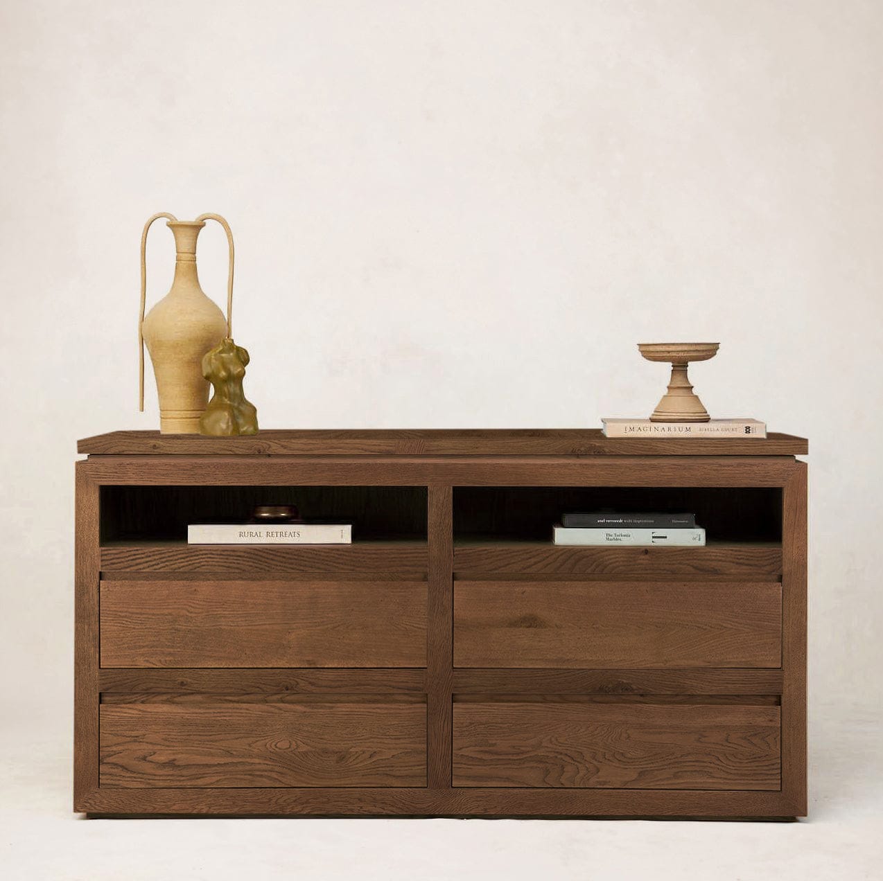 Sofita wood dresser in mocha styled with decorative objects