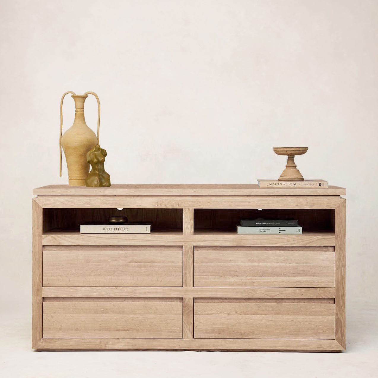 Sofita dresser styled with decorative objects and open shelf storage