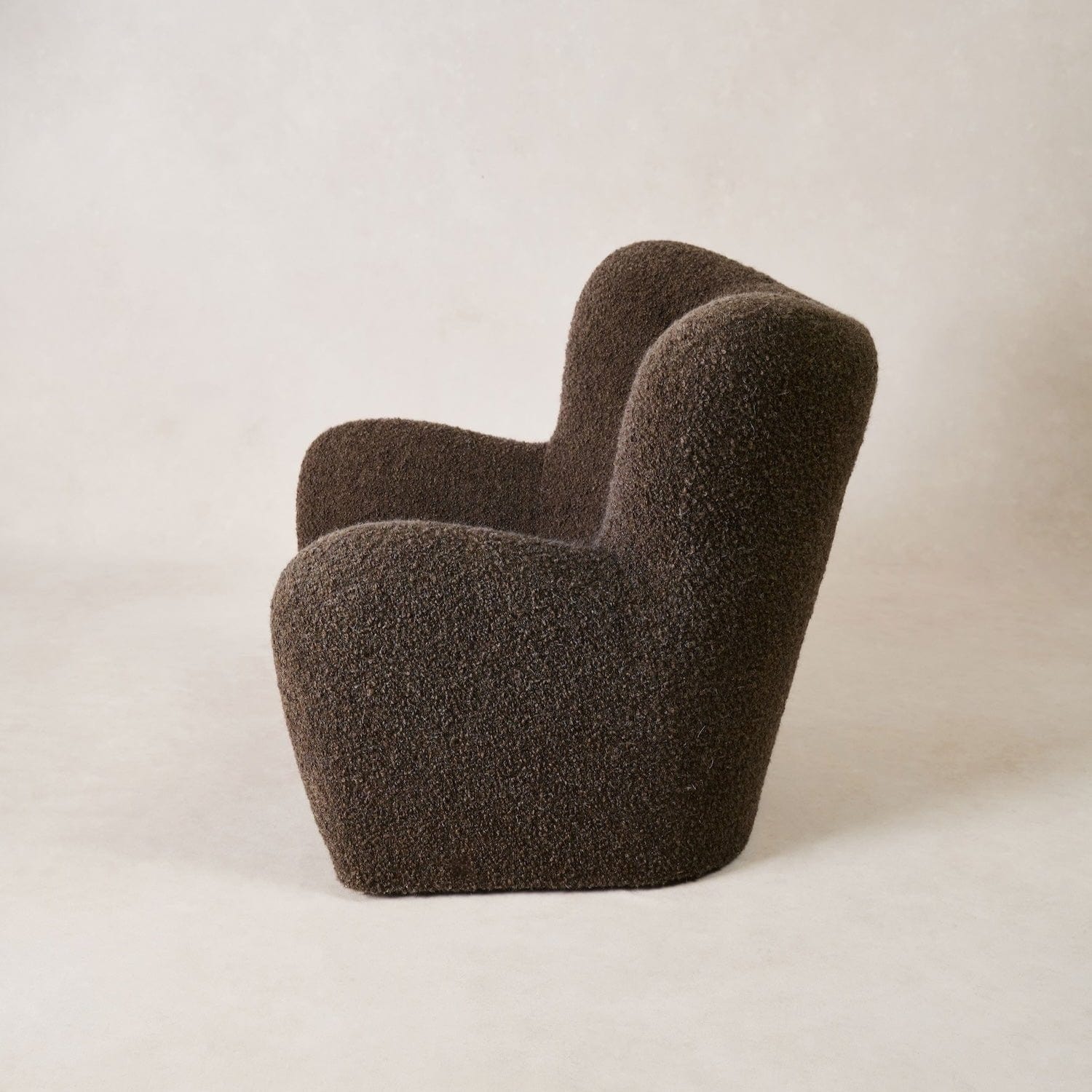 Papa Teddy Lounge Chair in mocha bouclé, side profile